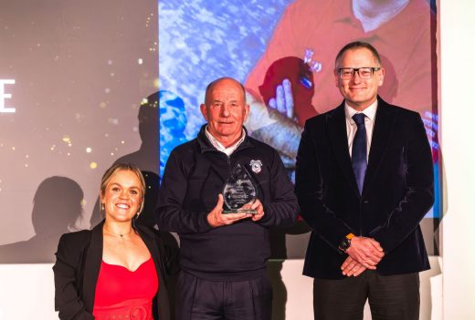 Billy Pye Collecting his award.